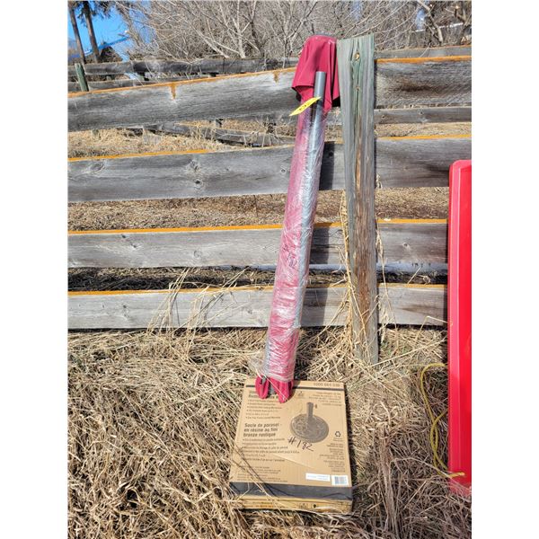 Red umbrella c/w stand, as new