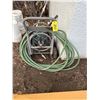 Image 1 : Garden hose and rolling cart