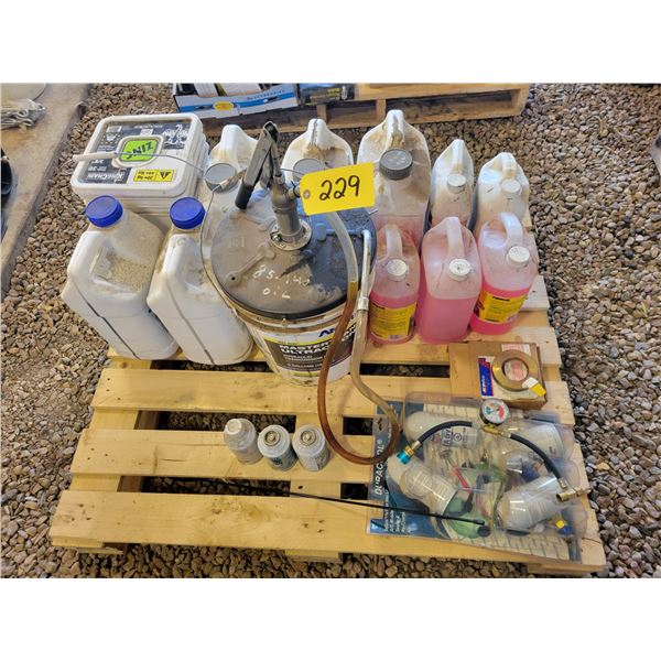 Pallet of windshield wash, A/C kit, air brake, antifreeze, hyd. Oil etc.