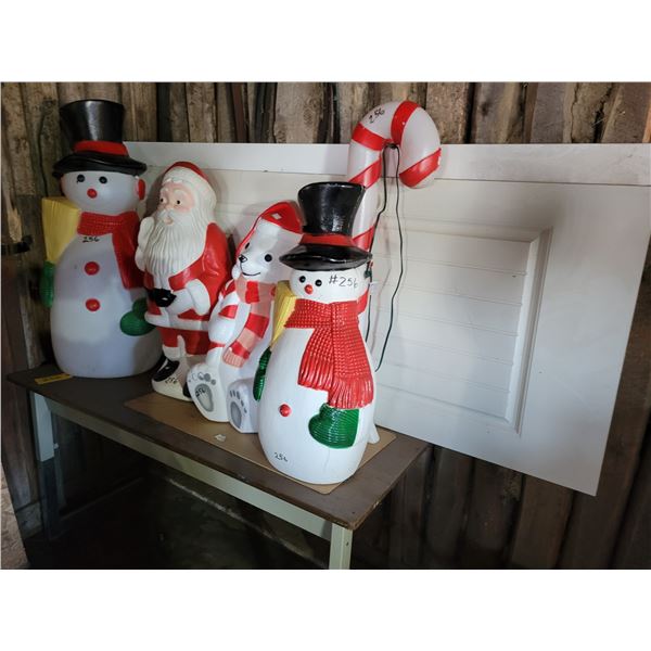 Qty of Christmas blow molds, metal table & door