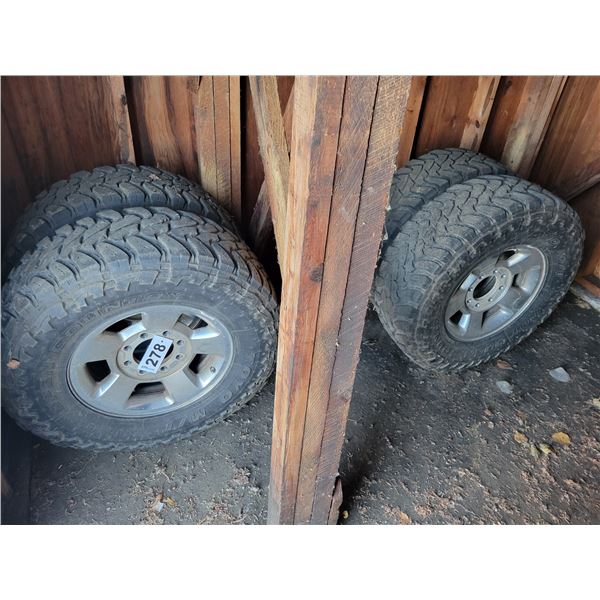 4- Toyo tires, 8- hole rims, LT295/70R17 (from Dodge 3/4 ton 4x4 truck)