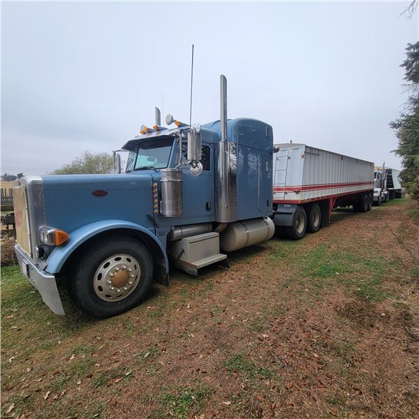 2005 Blue Peterbilt, cat C15, 475 Hp, 13 spd, showing 472,852 Kms, sleeper, 11R22.5 tires, sliding 5