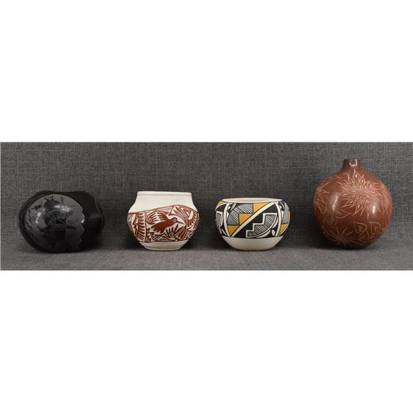 FOUR NATIVE AMERICAN POTTERY JARS