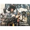 Image 1 : Pirates of the Caribbean: The Curse of the Black Pearl Geoffrey Rush and Isaac C. Singleton Jr. sign