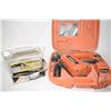 Image 1 : Paslode electric framing nailer with two batteries, charger and fuel cell, in fitted plastic case an