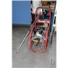 Image 1 : Homelite gas powdered 2700 PSI pressure washer with hose and wand, working at time of cataloguing