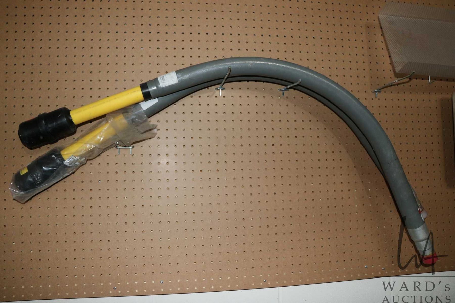 Two gas line risers underground pipes, each approximately 60