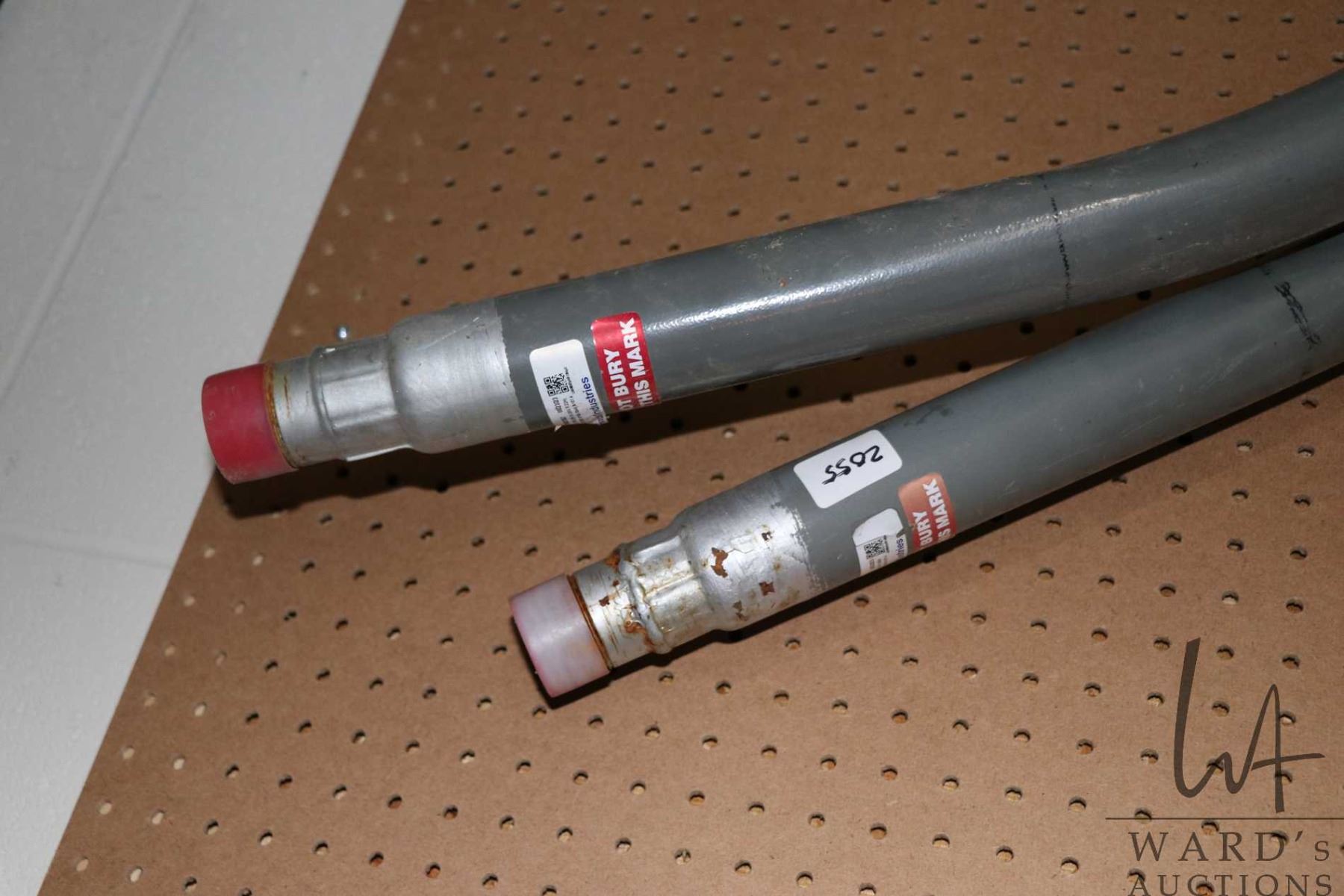 Liner Risers Two gas line risers underground pipes, each approximately 60