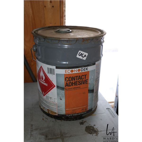 Contact adhesive 5 gallon drum partial used.