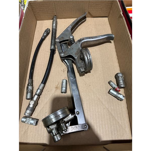 Assorted  grease gun parts