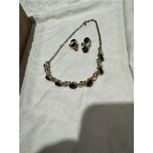 Silver with purple stones, necklace, and earrings