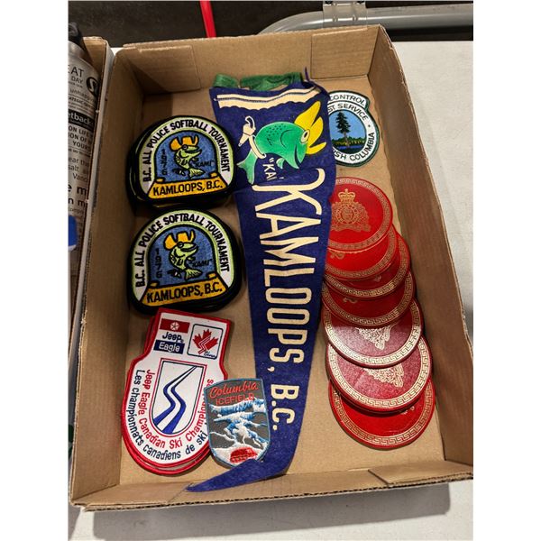 Assorted patches and pendant