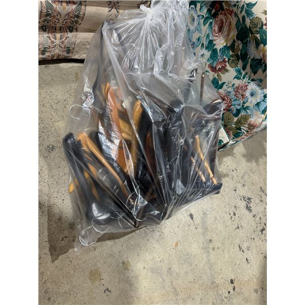 lot of wood hangers, and plastic