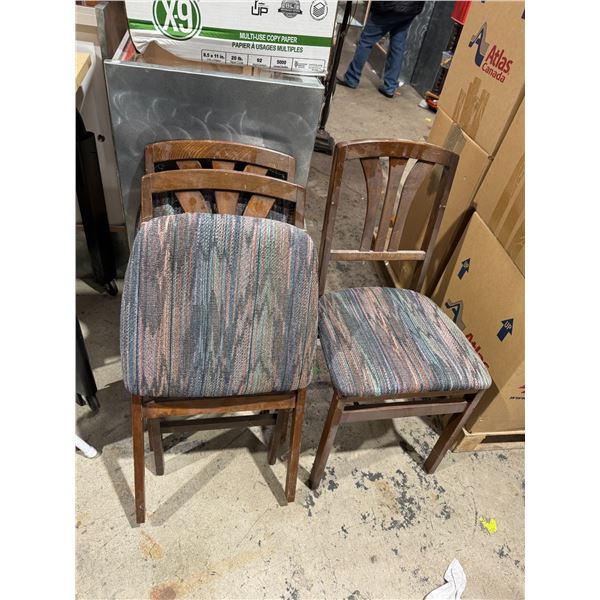 Three folding chairs