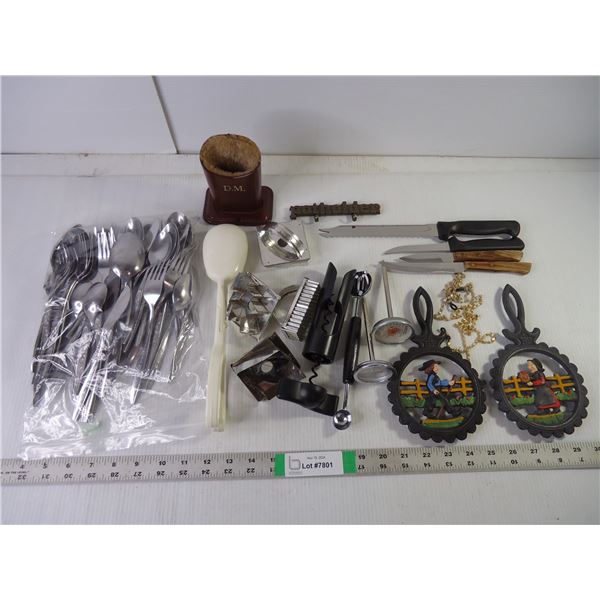Bag of assorted Silverware, Cookie Cutters, Trivets, Knives, Meat thermometers and misc.