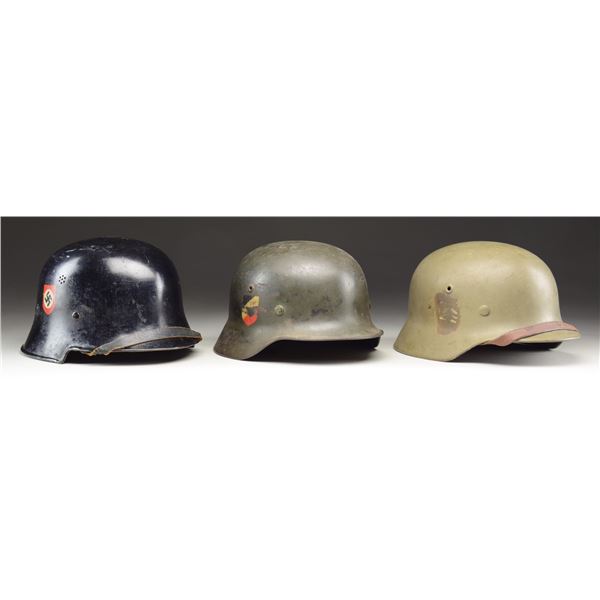 3 WWII GERMAN HELMETS.