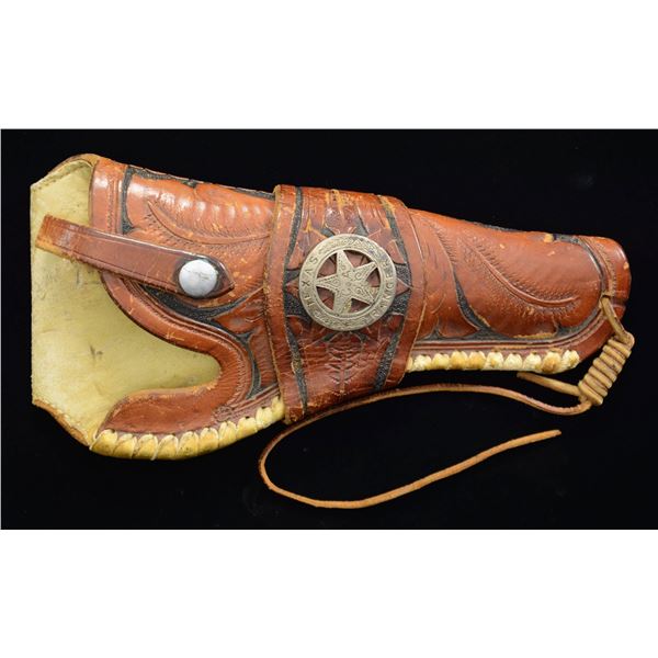 UNMARKED TOOLED LEATHER HOLSTER.