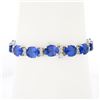 Image 3 : NEW 14k Gold 37.71 ctw Alternating Oval Tanzanite & Round Diamond Tennis Bracele
