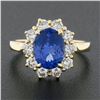 Image 2 : NEW 14k Yellow Gold 2.86 ctw Oval Violet Blue Tanzanite Round Diamond Halo Ring
