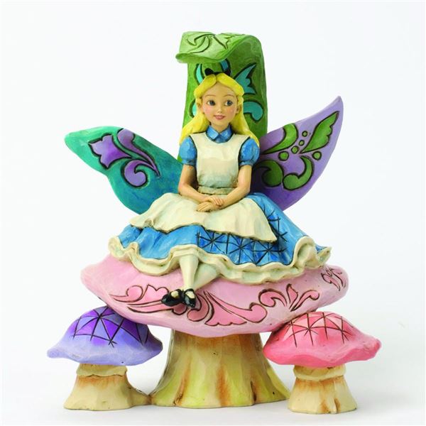 A Jim Shore “Alice in Wonderland” Figurine.