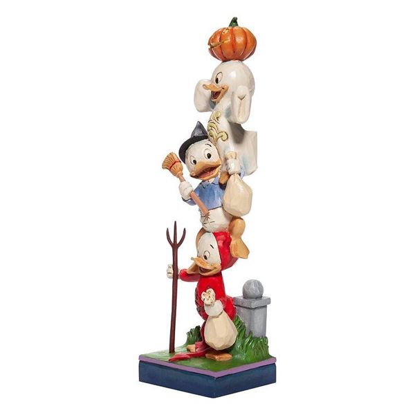 A Jim Shore “Teetering Trick-Or-Treaters” Huey, Dewey & Louie Figurine.