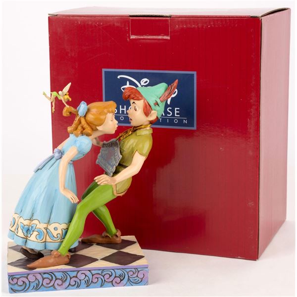 A Peter Pan, Wendy, and Tinker Bell 'An Unexpected Kiss' Figurine.