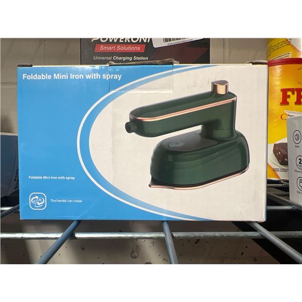Foldable mini clothing iron with spray function