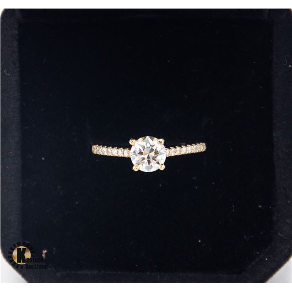 #1032-10KT YELLOW GOLD WEIGHING 2G WITH 0.70 CT