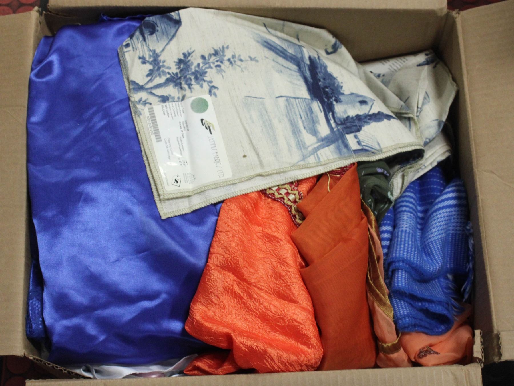 LARGE BOX OF ASSORTED FABRIC MATERIALS