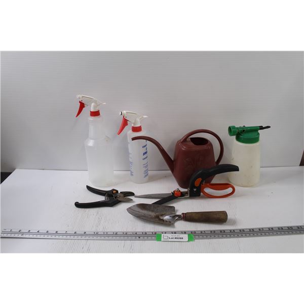 (3) Spray Bottles, (2) Smal Tree Trimmers, Watering Can, Garden Shovel