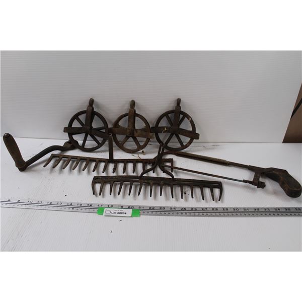 (3) Metal Pulleys, (2) Vintage Rake Heads, Saw, Crank Handle