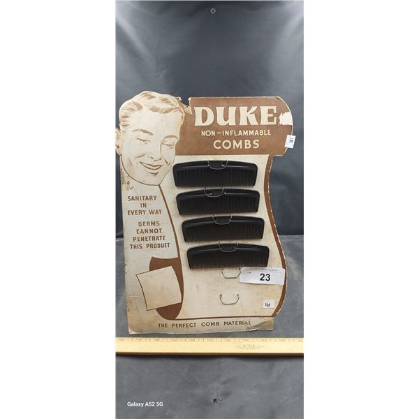 Vintage store display Duke non inflammable combs, 13"