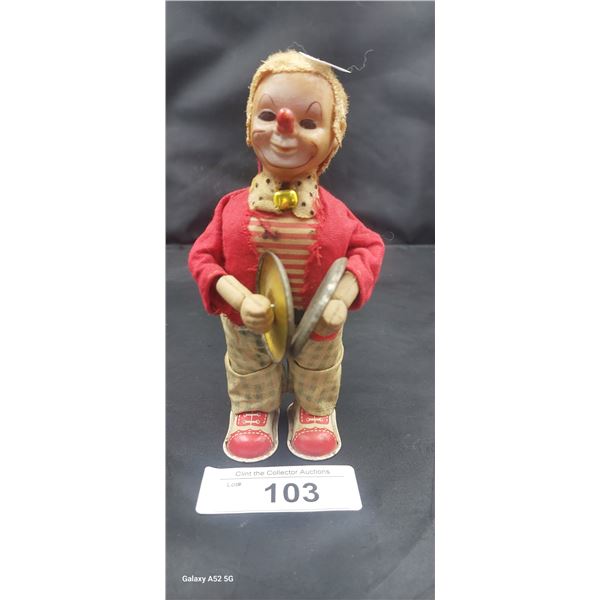 Vintage windup toy clown with cymbals