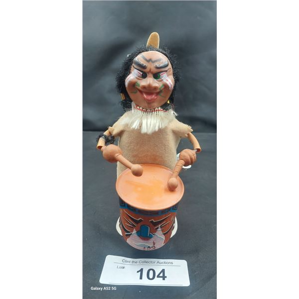 Vintage windup toy native drummer