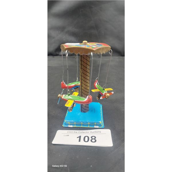 Vintage tin carousel