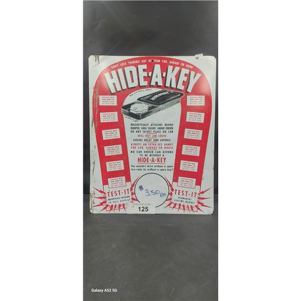 Vintage tin tacker sign, Hid-a-Key, 15"x12"