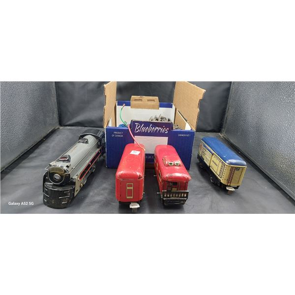 Lionel train collection 4 pieces plus transformer and some track