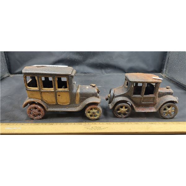 Pair of vintage cast iron cars