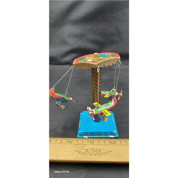 Vintage tin carousel in box