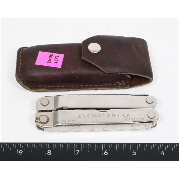 LEATHERMAN "SUPER TOOL" IN LEATHER BELT HOLDER