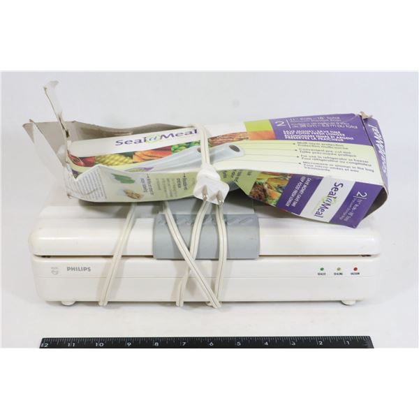 VACUUM SEALER WITH PARTIAL ROLL OF BAGS