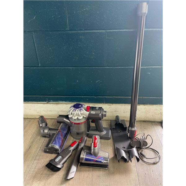 1 Dyson Vacuum Set with Charger & Various Accessories/Heads - Lightly Used - Works