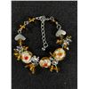 Image 2 : Vintage Jewelry Lot. Copper Rhinestone Necklace, Faux Turquoise and a Beautiful Flower and Resin( ?)