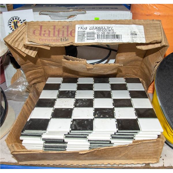 BOX OF BLACK AND WHITE CERAMIC TILE