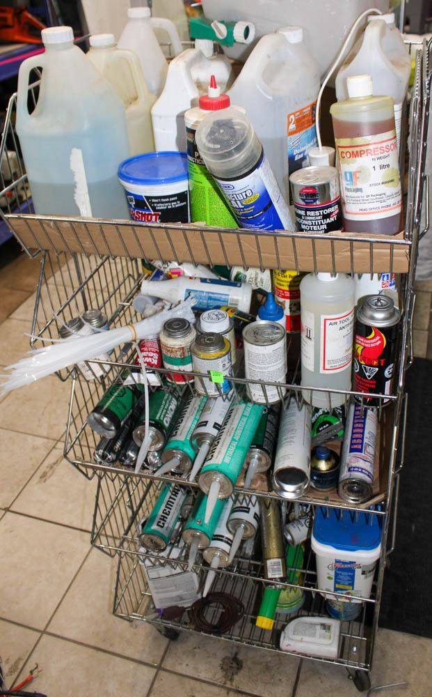 5 TIER WIRE RACK DISPLAY FULL OF MISC. CAULKING/