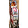 Image 1 : 4 TEIR MAGAZINE RACK W/ CONTENTS
