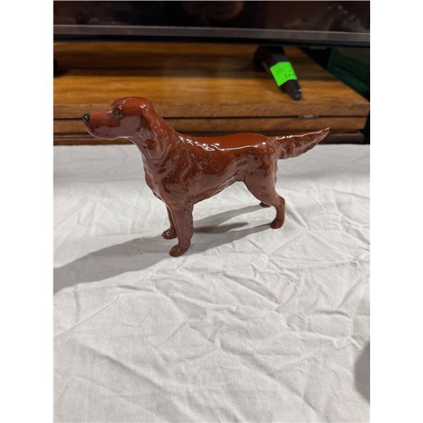 dog figurine small chip on back legs see picture
