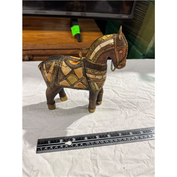 And laid brass and horn wooden horse figure