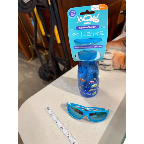 sunglasses and spoutless water bottle