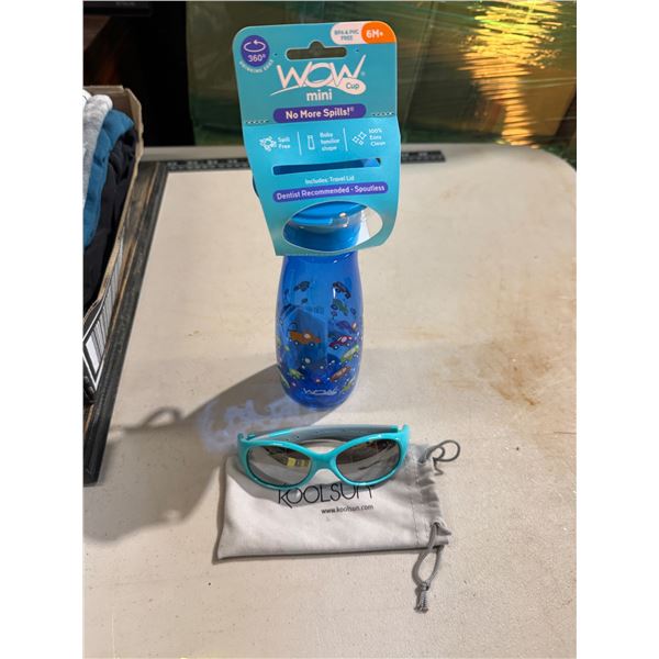 sunglasses and spoutless water bottle